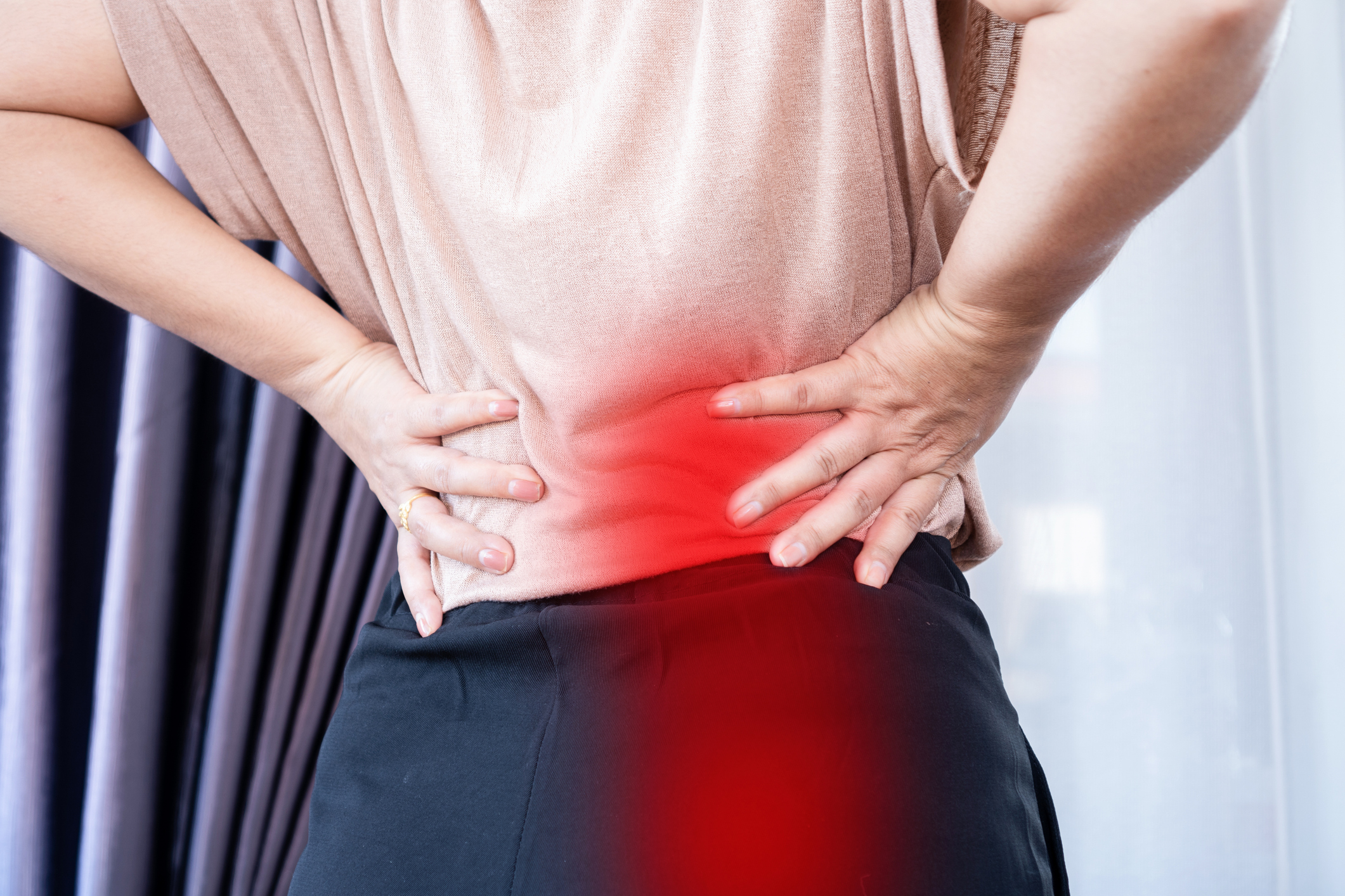 Person with sciatica nerve pain requiring specialized treatment in East Bay chiropractic clinic