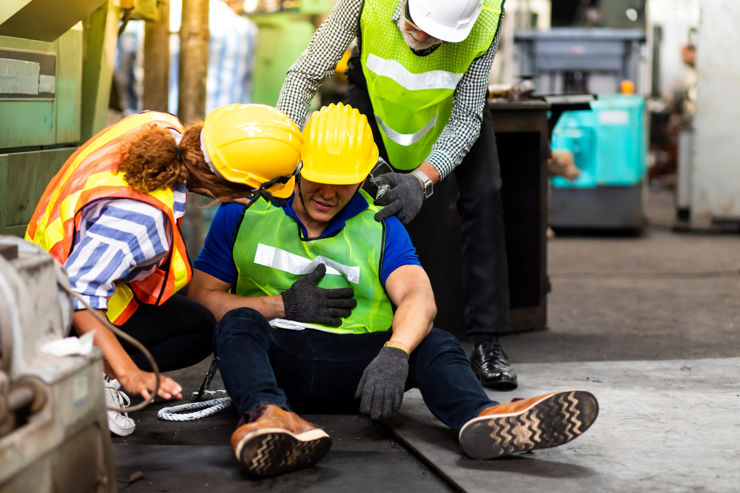Worker experiencing workplace injury requiring treatment at East Bay chiropractic clinic